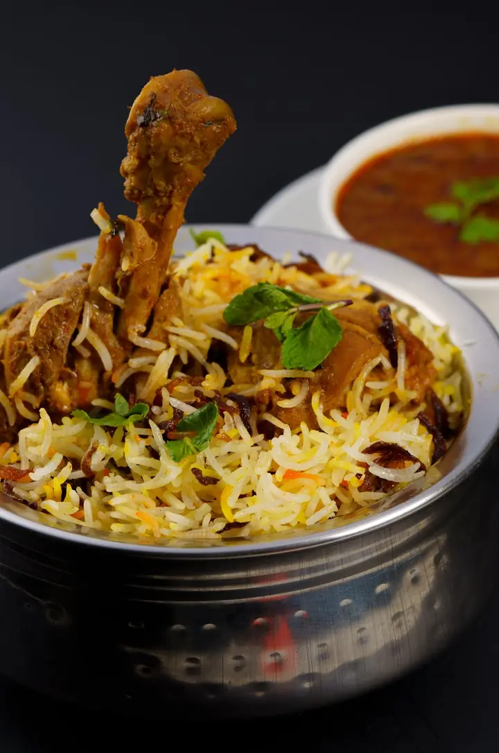 Chicken biryani in a steel handi (stock photo)